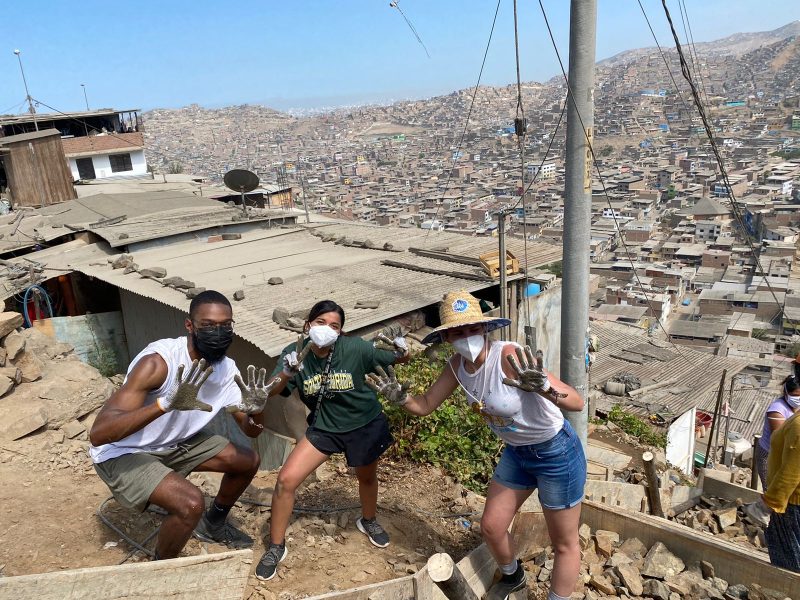 why do volunteers pay to travel abroad?